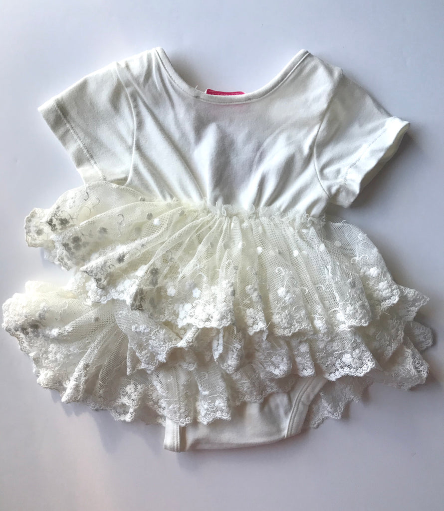 ivory-ruffle-baby-onesie-dress-back-its my party kids boutique